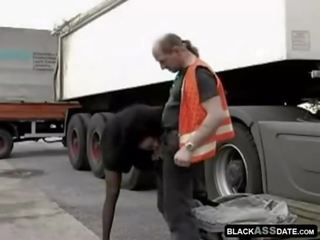 Black harlot riding on full-blown truck driver outside