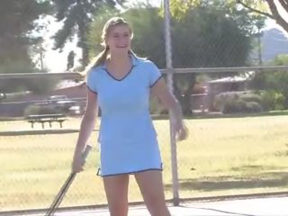 Beautiful brunette honey reveals her massive hooters at tenis court