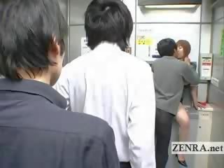 Bizarre Japanese post office offers busty oral sex clip ATM