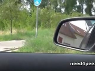Roller girl Squats To Piss On The Side Of The Road