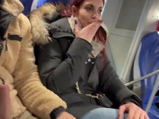 Handjob fast with cumming in the mouth between train seats