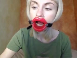 Zooming in Red Lips lead Mouth Gag for Dildo-blowjob.