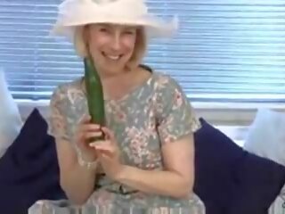 Perfected housewife fucks a cucumber